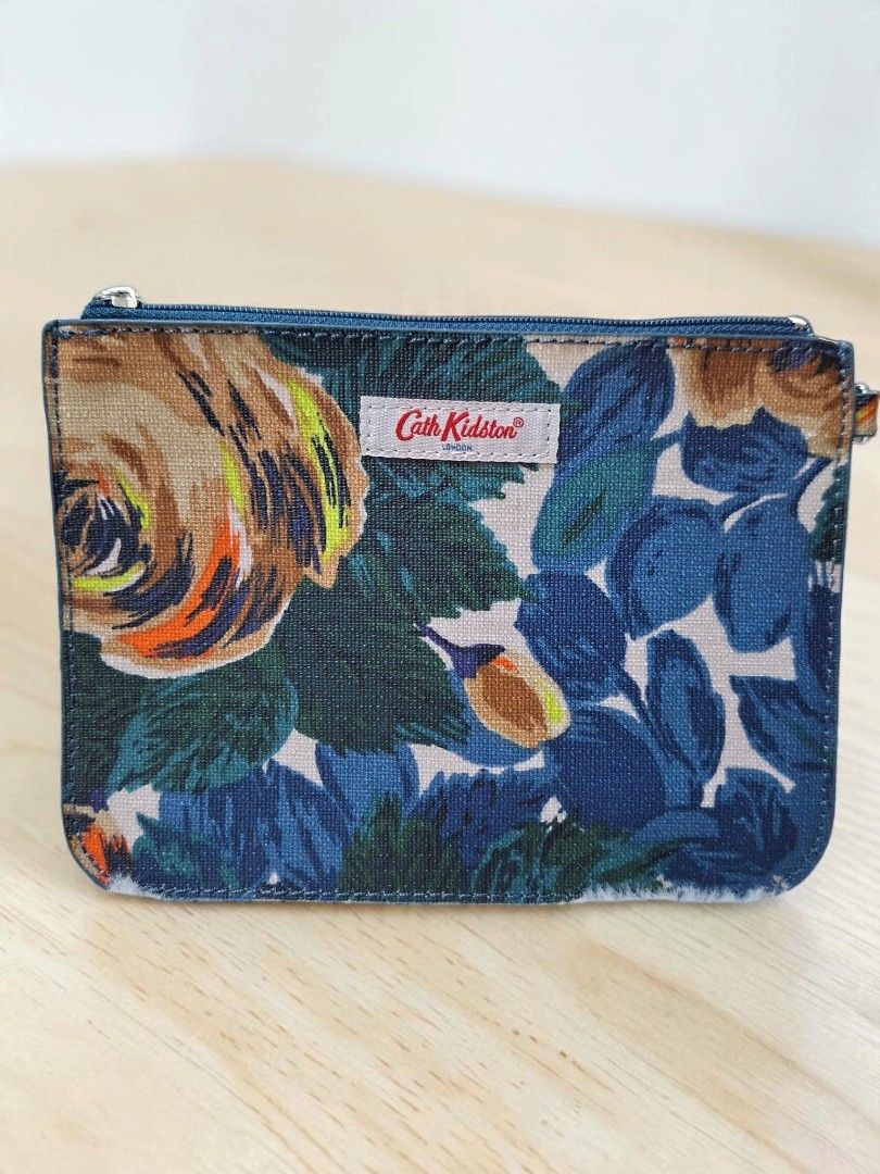 CATH KIDSTON POUCH (Category: Purses & Pouches) located in Las Pinas. Submitted by annachiaonair2037 (Listing ID 1468091500, Image 1). Description: CATH KIDSTON POUCH FROM JAPAN PVC LEATHER H 5" L 7" Disclaimer: I am not affiliated with, associated with, or authorized by any of the brands featured posted. Any mention of brand names, trademarks, or logos is solely for identification and reference purposes only..