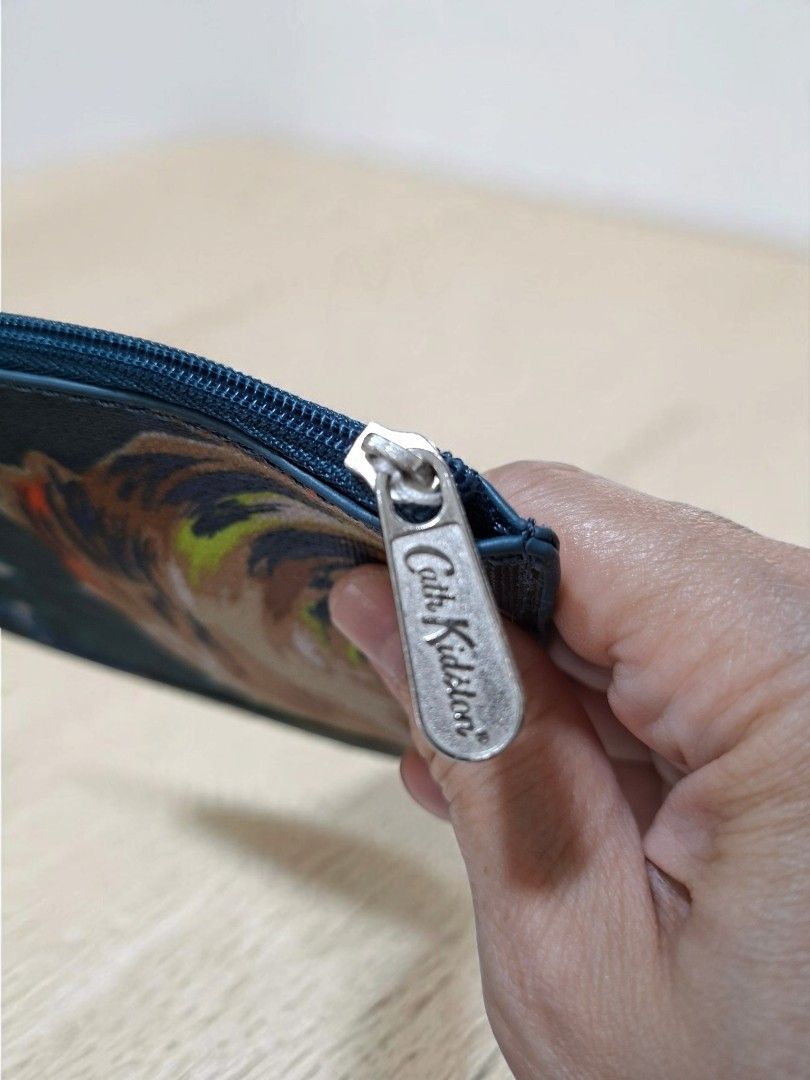 CATH KIDSTON POUCH (Category: Purses & Pouches) located in Las Pinas. Submitted by annachiaonair2037 (Listing ID 1468091500, Image 3). Description: CATH KIDSTON POUCH FROM JAPAN PVC LEATHER H 5" L 7" Disclaimer: I am not affiliated with, associated with, or authorized by any of the brands featured posted. Any mention of brand names, trademarks, or logos is solely for identification and reference purposes only..