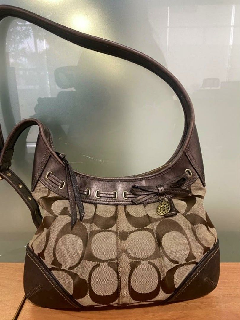 CCH Ergo Sling Bag (Category: Cross-body Bags) located in Manila. Submitted by sb_onlinestore (Listing ID 1468107378, Image 2). Description: - Needs cleaning outside and inside - No rubs - Dry leather - Has hangtag and dustbag.