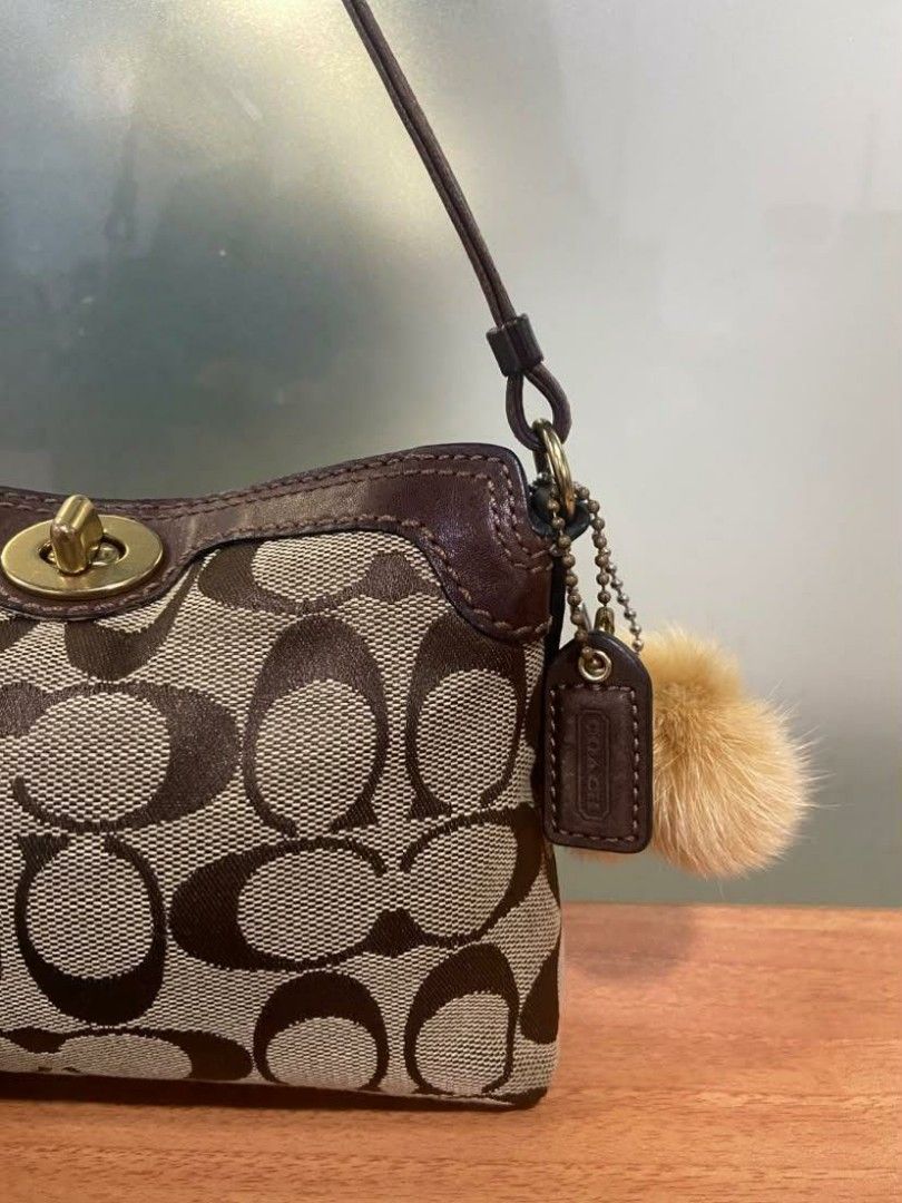 CCH Mini Turnlock (Category: Purses & Pouches) located in Manila. Submitted by sb_onlinestore (Listing ID 1468106752, Image 3). Description: - No rubs - Leather is slightly used - Good hardware - Clean exterior - Minimal dirt inside.
