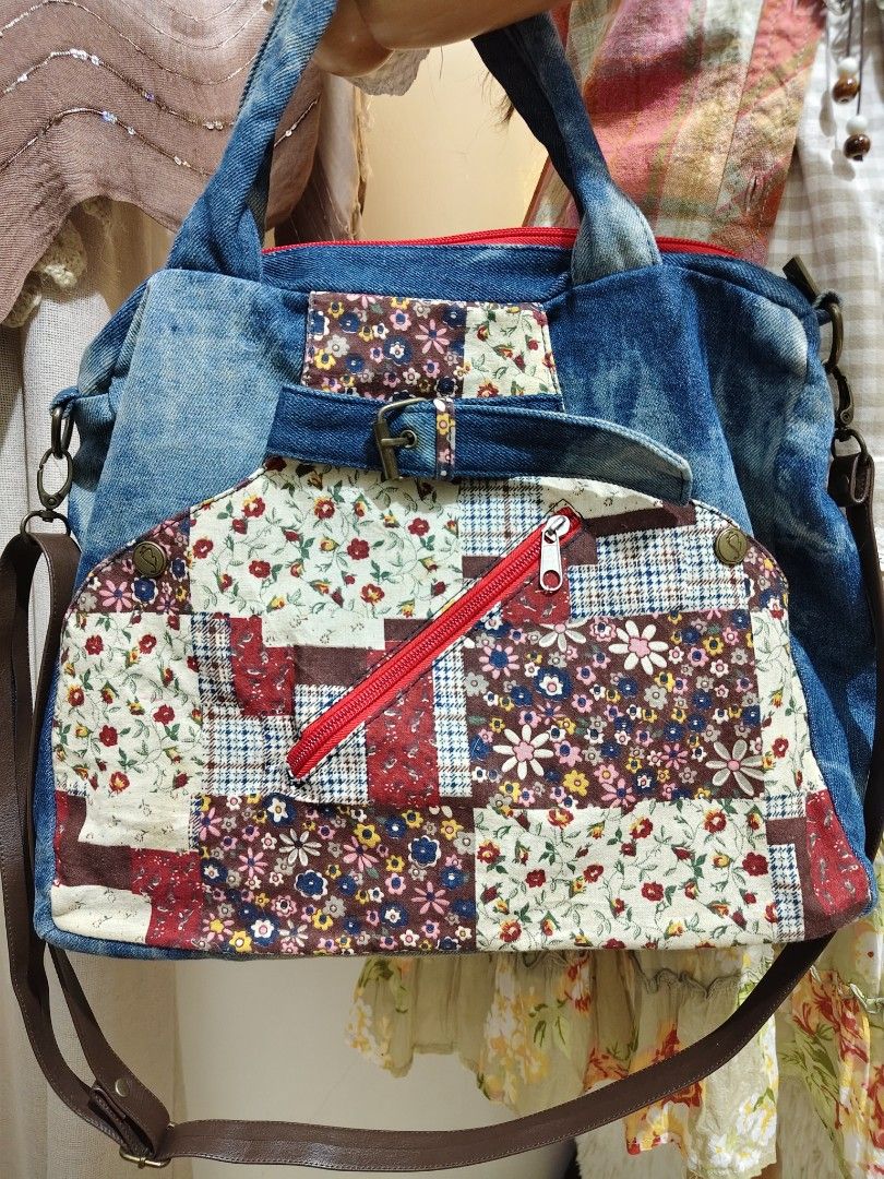CD:B01 Patchwork Denim Bag Laptop School Bag (Category: Tote Bags) located in Manila. Submitted by chynii_28 (Listing ID 1468131798, Image 2). Description: - Brand: Black Butterfly - Design: Denim and floral patchwork with a stylish red front zip pocket - Size: Handy and spacious, measures 10.5" in height and 13.5" in width - Ideal for: School or carrying a laptop - Strap: Includes an adjustable brown shoulder strap - Condition: Excellent, no fla