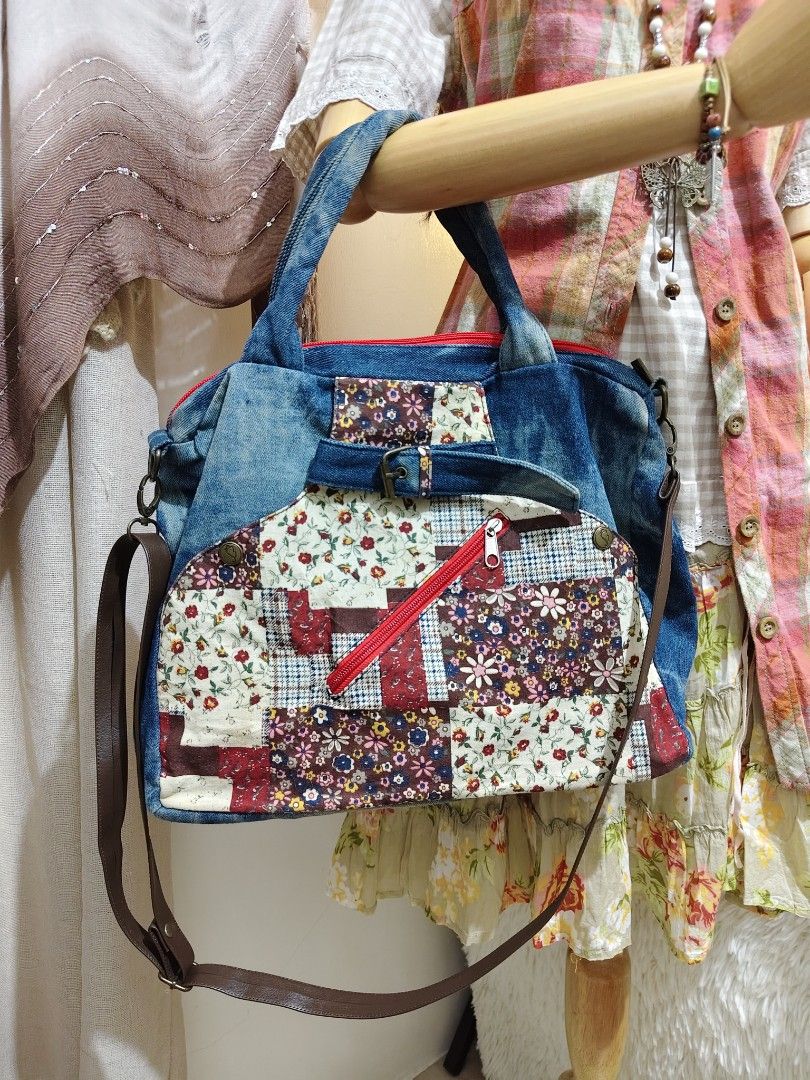 CD:B01 Patchwork Denim Bag Laptop School Bag (Category: Tote Bags) located in Manila. Submitted by chynii_28 (Listing ID 1468131798, Image 3). Description: - Brand: Black Butterfly - Design: Denim and floral patchwork with a stylish red front zip pocket - Size: Handy and spacious, measures 10.5" in height and 13.5" in width - Ideal for: School or carrying a laptop - Strap: Includes an adjustable brown shoulder strap - Condition: Excellent, no fla