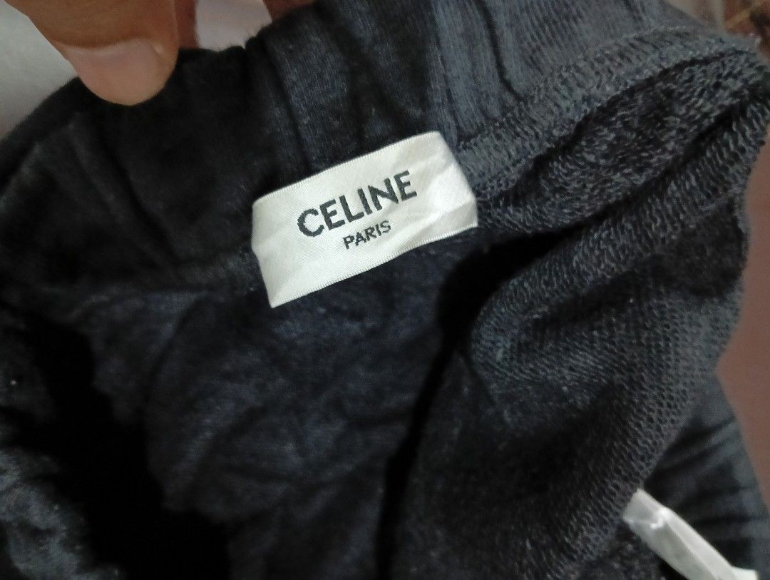 Celine Paris Black Drawstring Sweat Shorts Size L (Category: Shorts) located in Odiongan. Submitted by thrifthub_bundang07 (Listing ID 1468086781, Image 2). Description: - Brand: Celine Paris - Color: Solid Black - Size: L (tag attached near elastic waistband) - Material: Soft and warm fleece inside for maximum comfort - Details: White drawstring with silver metal aglets stamped with Celine branding, plus a small embroidered Triomphe logo on the 