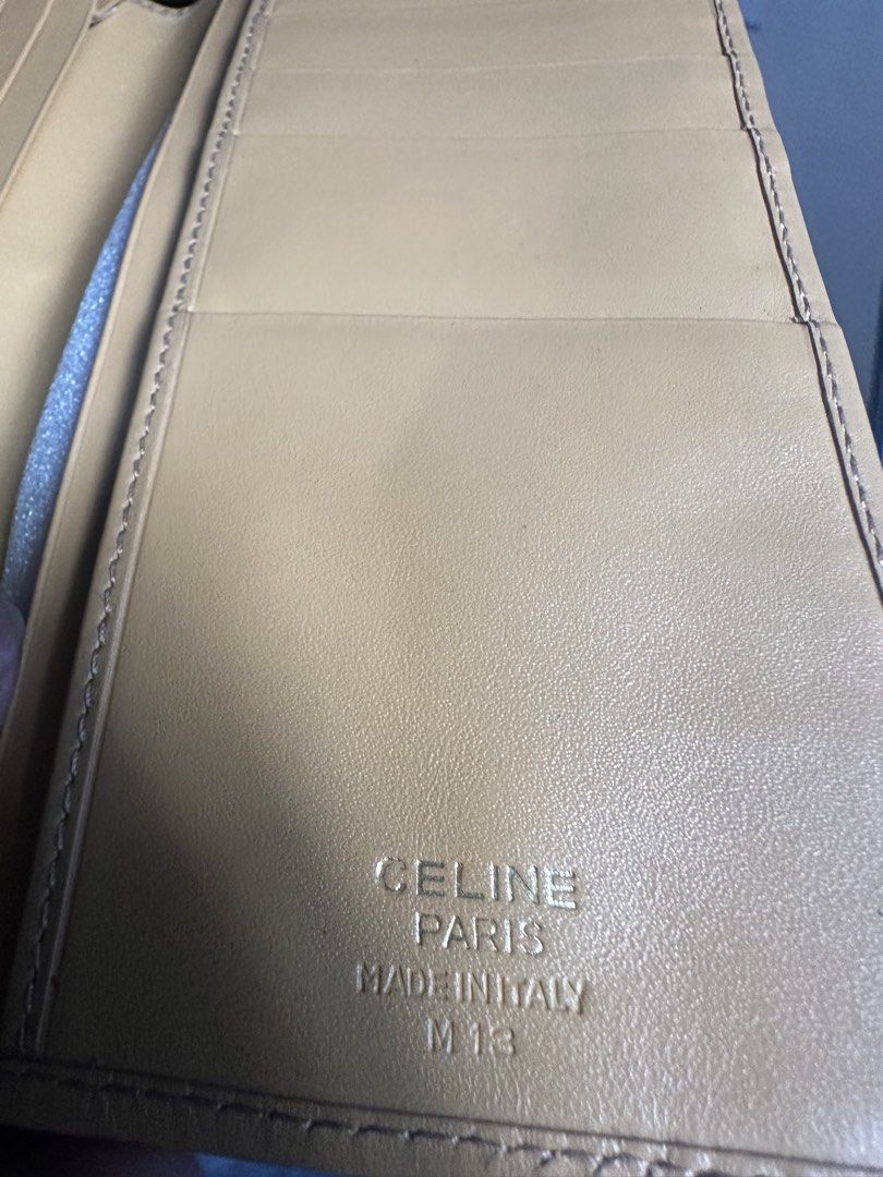 Celine Paris Triomphe Macadam Long Wallet Brown Tan (Category: Luxury Bags & Wallets) located in Makati City. Submitted by js0615 (Listing ID 1468278831, Image 2). Description: - Brand: Celine Paris (Made in Italy) -Vintage - Exterior: Brown canvas with iconic monogram and Triomphe motif - Interior: Smooth tan leather with clean lining and gold-stamped logo - Organization: Multiple card slots and cash compartments - Design: Slim profile, folds fl