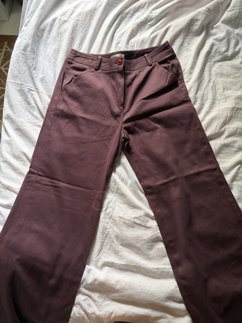 Chaber Maroon Wide Leg Pants (Category: Jeans) located in General Santos City (Dadiangas). Submitted by jwtfg (Listing ID 1468111039, Image 2). Description: - Brand/Style: Chaber dark maroon wide leg trousers - Closure: Front zipper with a secure waist button - Pockets: Convenient deep pockets on both sides - Design: Structured fabric, clean interior waistband lining, and belt loops - Versatility: Perfect everyday pants for both casual outings an