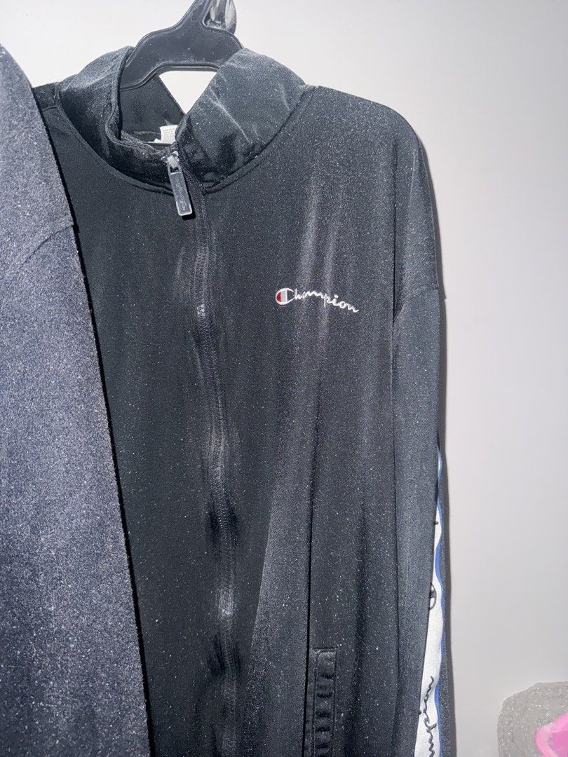 Champion Black Full Zip Track Jacket XL (Category: Coats, Jackets and Outerwear) located in Pasig City. Submitted by Andyglambeautyph (Listing ID 1468070565, Image 1). Description: - Brand: Champion - Style: Full zip track jacket - Color: Black - Size: XL - Material: 100% polyester (Made in Jordan) - Features: Classic embroidered script logo on chest, high mock neck collar, functional side pockets - Condition: Excellent, easy everyday layer for c