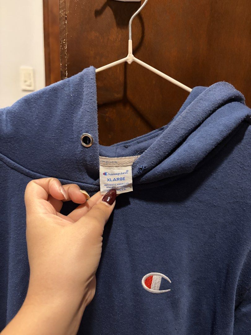 Champion Hoodie Blue (Category: Hoodies) located in Angeles City. Submitted by astravintage (Listing ID 1468144182, Image 3). Description: Auth, Flaws yung sa taas check pics nawala na lagayan nung tali dahil sa washing machine :( .