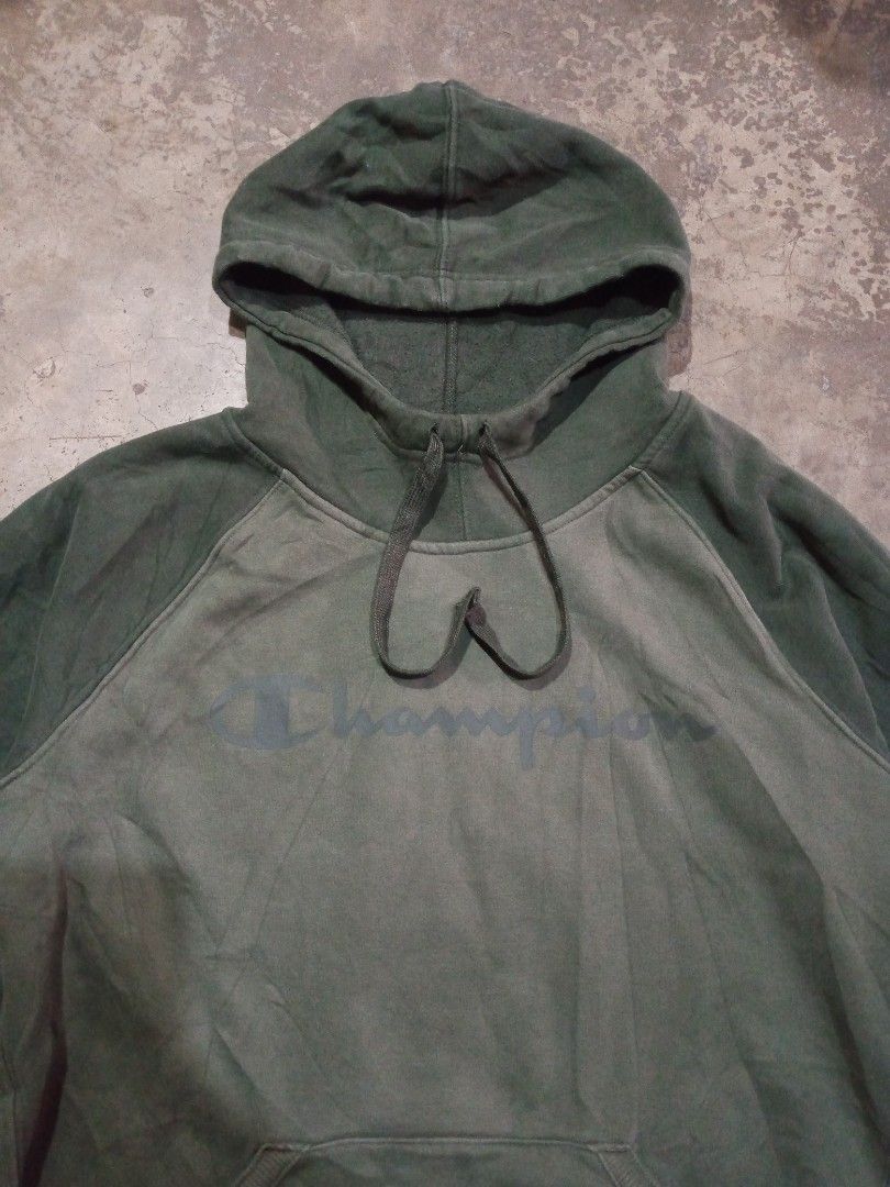 Champion Script Pullover Hoodie Olive Green (Category: Coats, Jackets and Outerwear) located in Cabuyao City. Submitted by kenzu_stuff (Listing ID 1468090435, Image 2). Description: Champion Script Pullover Hoodie Olive Green - Size: XL on tag, M-L fittings - Length: 26" - Width: 23" - Issue: NONE - Condition: Good - Color Rate: 9.8/10 - Color may vary due to lighting. - Thrifted item(s), please manage your expectations. We do shipping nationwide