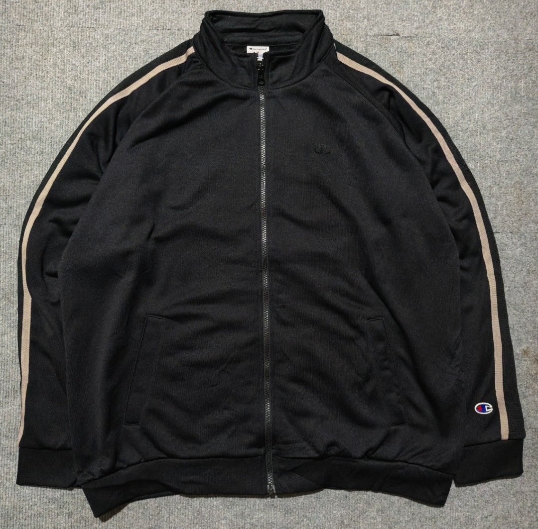 CHAMPION TRACK JACKET (Category: Coats, Jackets and Outerwear) located in Midsayap. Submitted by indigoventure (Listing ID 1468078564, Image 2). Description: Champion track jacket Excellent Condition 💯 ✨ Authentic ✨ Width 25 Length 28 This track jacket is made from a polyester fabric with a classic, matte, dry feel. The C logo on the left chest is a flock print in the same color as the body, and there are contrasting fabric stripes on both sleev