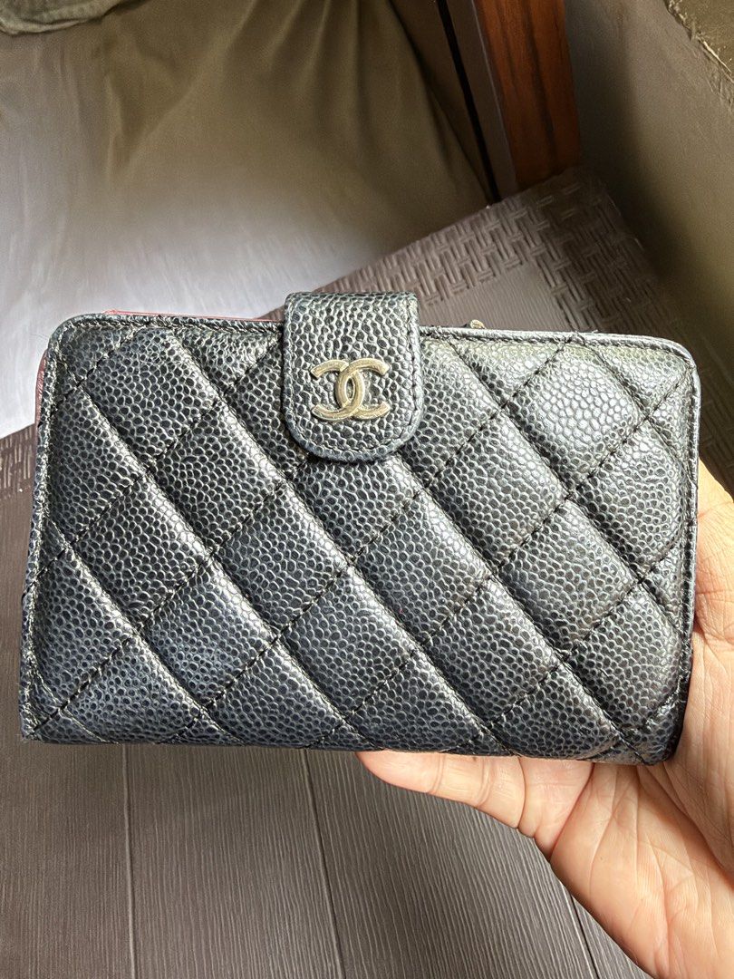 CHANEL BIFOLD ZIP WALLET (Category: Wallets & Card holders) located in Magsaysay. Submitted by goodiesthift (Listing ID 1468066648, Image 1). Description: Highlights black quilted finish C-logo plaque press-stud fastening internal card slots zip-fastening pocket rear slip pocket silver tone hardware Condition: GOOD. This previously owned and used item is in good condition with minimal signs of use. Wallet measurements Height: 9.5 cm (3.74 in) Dep