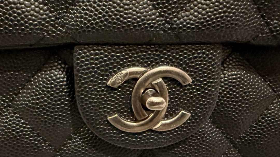 XXL Chanel Airport Bag (Category: Luxury Bags & Wallets) located in Manila. Submitted by nekynek (Listing ID 1468192949, Image 3). Description: -XXL Chanel Airport Bag in Caviar - Silver Hardware - Signature interlocking CC twist lock closure - Classic quilted pattern with a convenient back slip pocket - Convertible leather-woven double chain strap - Clean interior with Chanel Paris stamped hardware - Includes branded white dust bag with quilted 