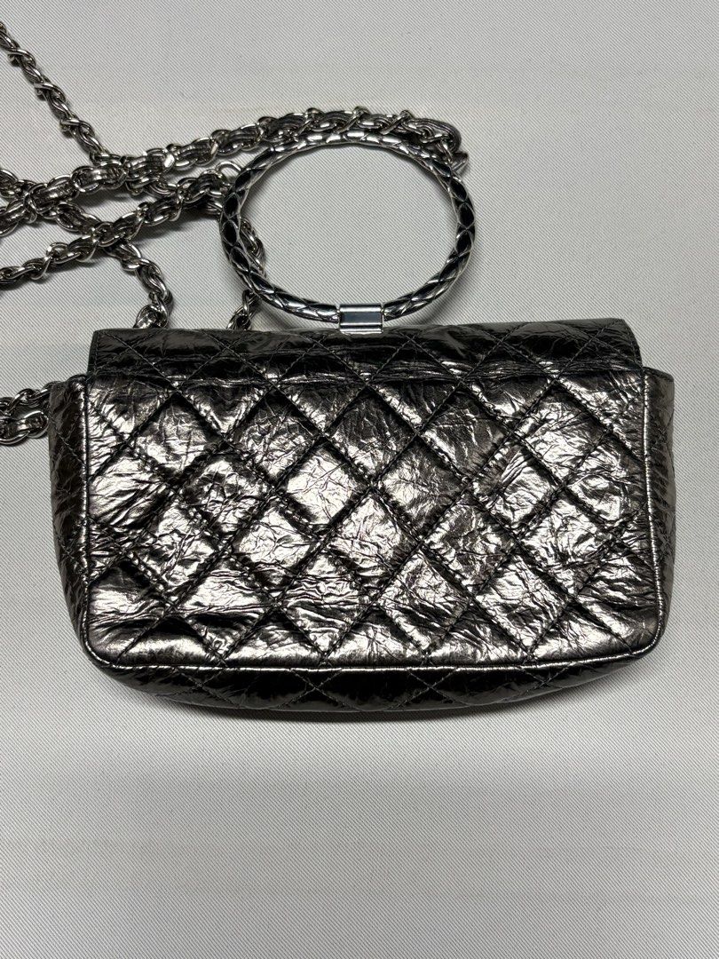 CHANEL Metallic Calfskin Mini Ring Handle Flap Bag (Category: Luxury Bags & Wallets) located in Baguio. Submitted by viibodegaaa (Listing ID 1468144081, Image 3). Description: CHANEL Metallic Calfskin Mini Ring Handle Flap Bag No major flaw malinis, small tarnish sa may lock .