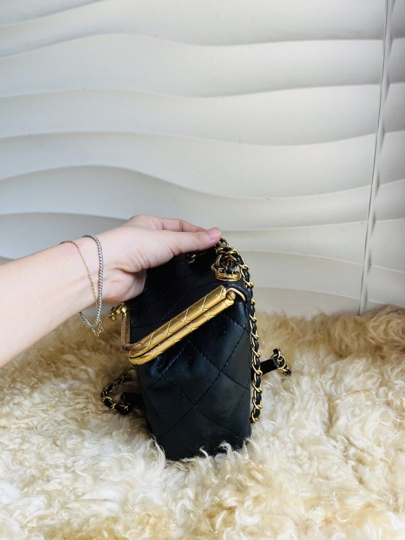 Chanel My Crush Chain Bag (Category: Luxury Bags & Wallets) located in Davao. Submitted by goodthingsph_ (Listing ID 1468076737, Image 2). Description: - Material: Black quilted leather with antique gold-tone hardware - Closure: Structured frame top with iconic interlocking CC clasp - Straps: Short chain handle and long strap for shoulder/crossbody wear - Interior: Champagne satin lining with gold stamped logo and side pocket compartments - Style