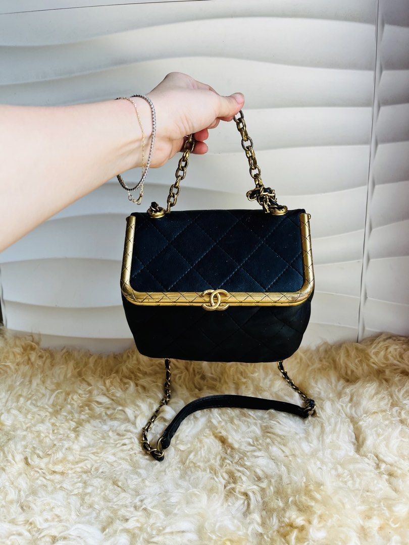 Chanel My Crush Chain Bag (Category: Luxury Bags & Wallets) located in Davao. Submitted by goodthingsph_ (Listing ID 1468076737, Image 1). Description: - Material: Black quilted leather with antique gold-tone hardware - Closure: Structured frame top with iconic interlocking CC clasp - Straps: Short chain handle and long strap for shoulder/crossbody wear - Interior: Champagne satin lining with gold stamped logo and side pocket compartments - Style