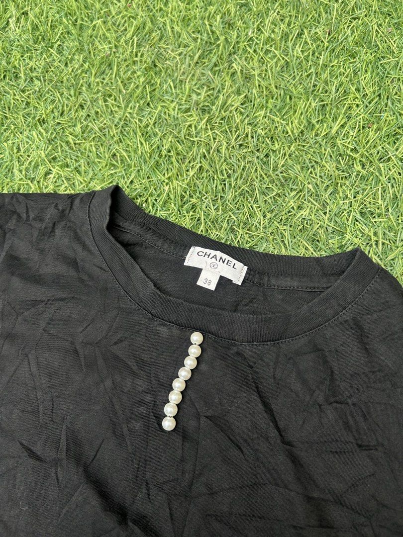 Chanel Top black (Category: Luxury Apparel) located in Santa Rosa. Submitted by unexpected.finds4026 (Listing ID 1468197776, Image 2). Description: Chanel size 38 on tag best fit to S- M complete tags 9.5/10 condition no flaws need wash .