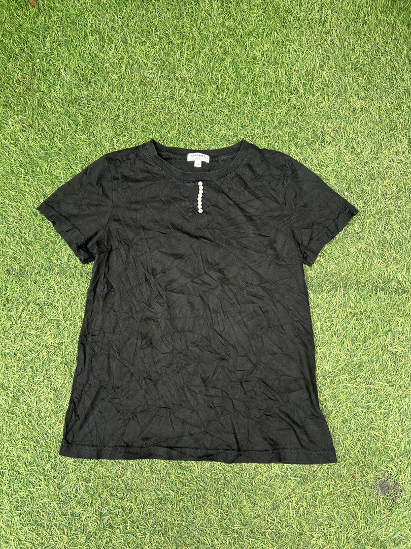 Chanel Top black (Category: Luxury Apparel) located in Santa Rosa. Submitted by unexpected.finds4026 (Listing ID 1468197776, Image 1). Description: Chanel size 38 on tag best fit to S- M complete tags 9.5/10 condition no flaws need wash .