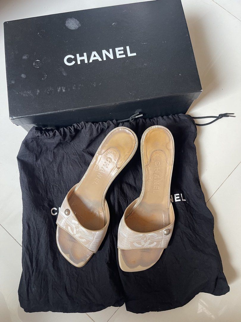 Chanel Travel line CC Canvas Heels (Category: Sneakers & Footwear) located in Davao. Submitted by boodle4lyf (Listing ID 1468104529, Image 1). Description: Authentic Chanel beige canvas CC logo mules in size 37.5, made in Italy. Features a slip-on kitten heel, quilted heel, and CC button accent. Shows significant wear on footbeds, toes, and soles. Includes original box and dust bag..