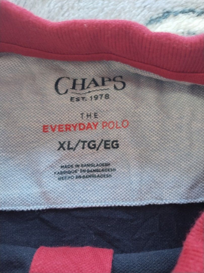 Chaps "The Everyday Polo" — Size XL (Category: Tshirts & Polo Shirts ) located in Mabalacat. Submitted by al_amin_thrift (Listing ID 1468127821, Image 2). Description: Chaps "The Everyday Polo" — Size XL ✅ 100% Authentic Chaps — established 1978 ✅ Size XL — classic regular fit ✅ Navy blue with red & white trim — timeless smart-casual style ✅ 100% cotton pique — breathable & comfortable all day ✅ Embroidered crest logo detail ✅ Good pre-loved cond