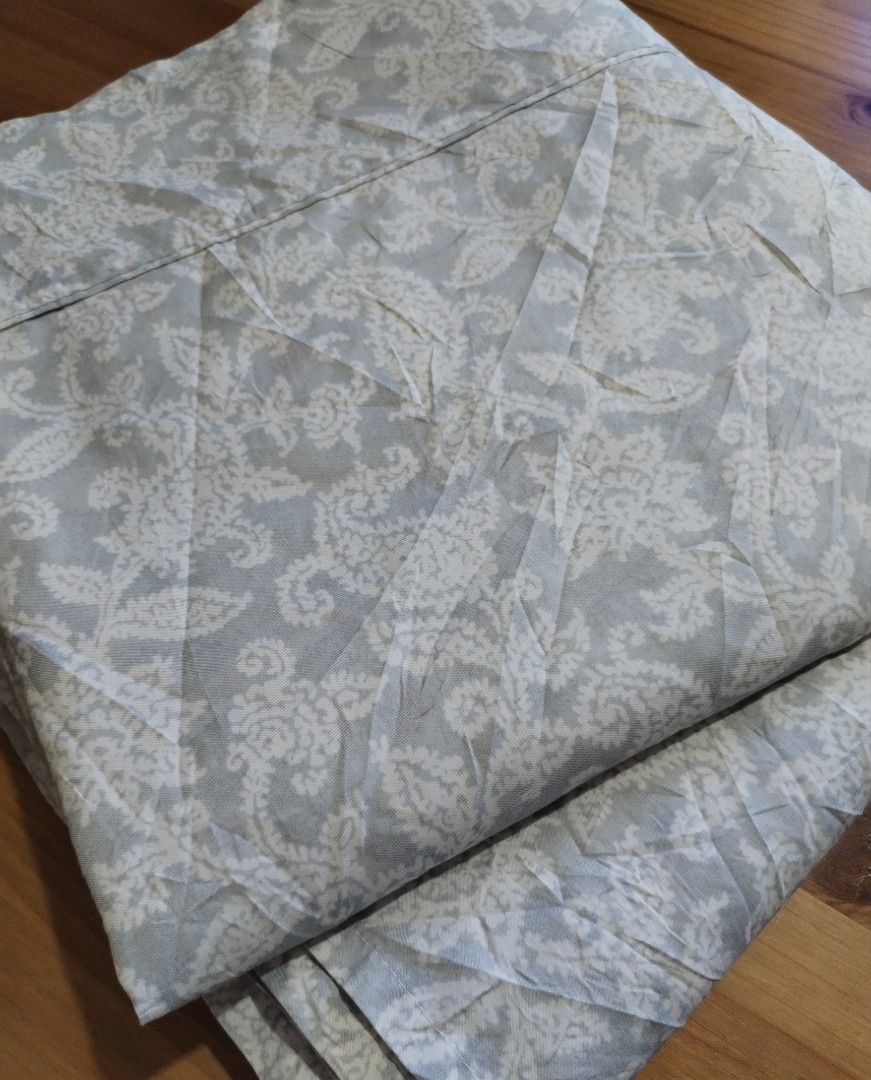 Charisma Flatsheet ( king) (Category: Bedding & Towels) located in Muntinlupa City. Submitted by arciagamaryann68 (Listing ID 1468098242, Image 2). Description: - Color: Elegant grey with a white paisley and floral pattern - Material: Soft, high-quality cotton for a comfortable sleep - Design: Classic vintage look that suits standard bedroom setups - Condition: Clean, fresh, and ready for immediate use.