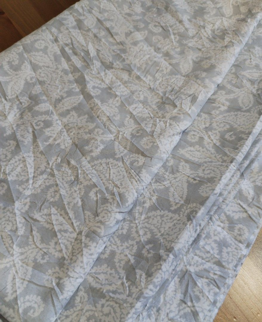 Charisma Flatsheet ( king) (Category: Bedding & Towels) located in Muntinlupa City. Submitted by arciagamaryann68 (Listing ID 1468098242, Image 3). Description: - Color: Elegant grey with a white paisley and floral pattern - Material: Soft, high-quality cotton for a comfortable sleep - Design: Classic vintage look that suits standard bedroom setups - Condition: Clean, fresh, and ready for immediate use.