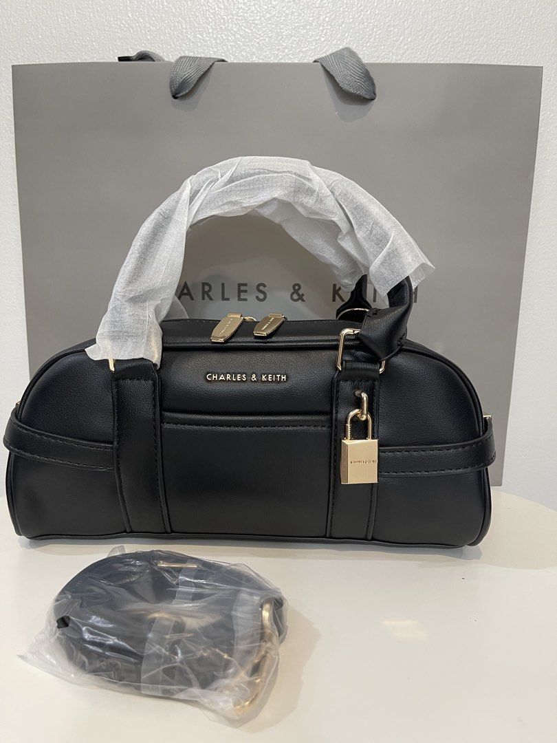 Charles & Keith Bowling Bag - Black (Category: Shoulder Bags) located in Pasig City. Submitted by preloved.closet2 (Listing ID 1468085702, Image 1). Description: Bowling bag With Sling straps Color Black Add paperbag plus 80 .