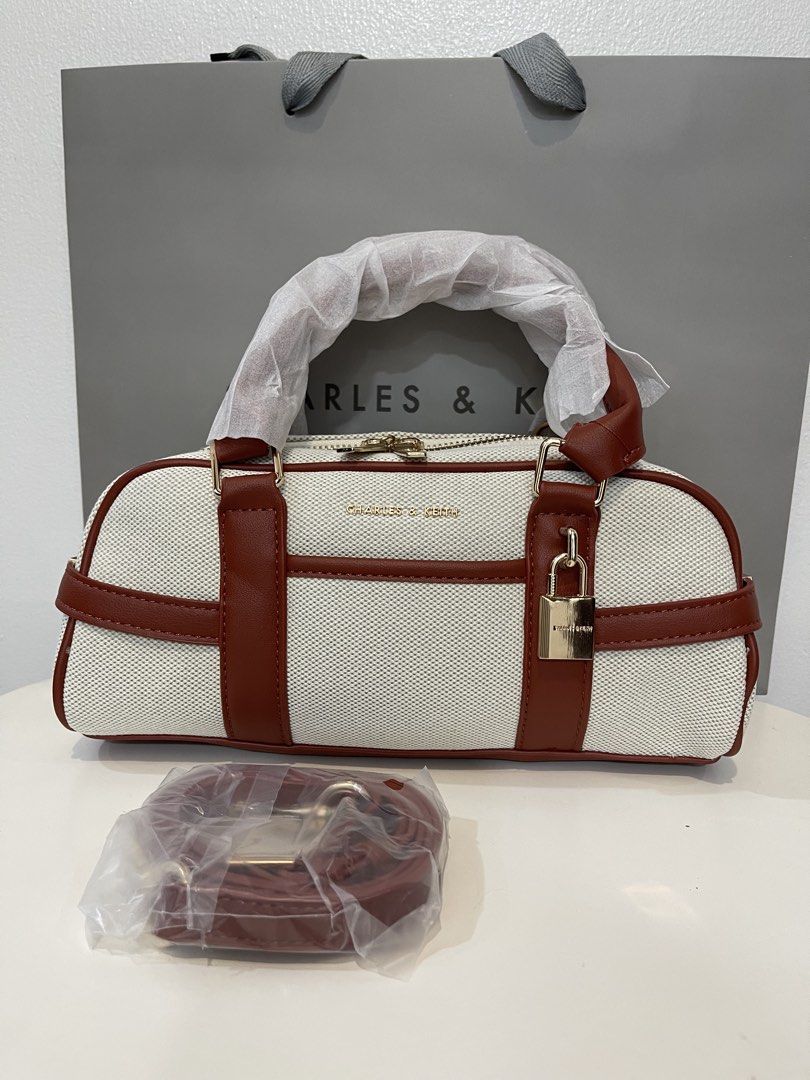 Charles & Keith Canvas Bowling Bag - 2tone (Category: Shoulder Bags) located in Pasig City. Submitted by preloved.closet2 (Listing ID 1468085471, Image 1). Description: Bowling bag With Sling straps Color Canvas 2 tone Add paperbag plus 80 .
