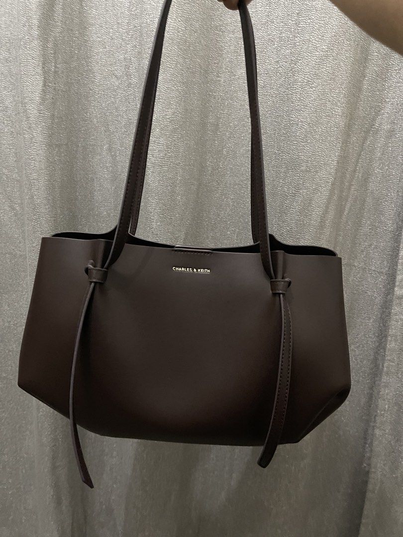 Charles & Keith Dark Brown Tote Bag (Category: Tote Bags) located in Manila. Submitted by prelovedcuties21 (Listing ID 1468076147, Image 1). Description: Authentic Charles & Keith Calla Tote Bag in Espresso Brown .
