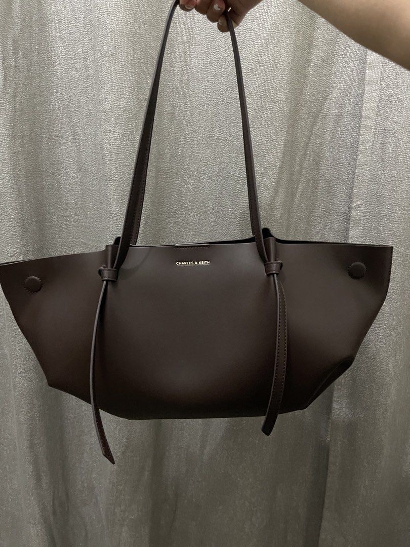 Charles & Keith Dark Brown Tote Bag (Category: Tote Bags) located in Manila. Submitted by prelovedcuties21 (Listing ID 1468076147, Image 2). Description: Authentic Charles & Keith Calla Tote Bag in Espresso Brown .