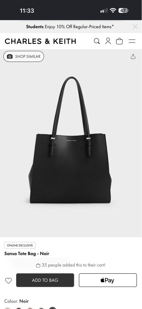 Charles & Keith Sansa Tote Bag Noir Black (Category: Tote Bags) located in Manila. Submitted by trinketsofhappiness (Listing ID 1468083713, Image 2). Description: - Brand: Charles & Keith - Model: Sansa Tote Bag - Color: Classic Black - Material: Textured faux leather with gold-tone hardware - Closure: Top zip with branded zipper pull - Features: Structured design, double top handles, and a spacious interior - Condition: Clean inside and out, exc