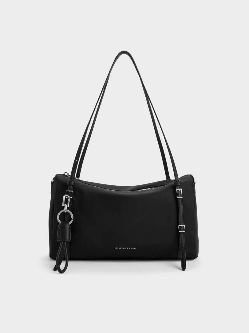 Charles and Keith Levy Nylon Shoulder Bag (Category: Shoulder Bags) located in Taguig. Submitted by poshcity (Listing ID 1468160204, Image 1). Description: ✨PLEASE MAKE READING A HABIT✨ INCLUSIONS: ✨: With Tag ✨: What you see is what you get ✨: Manage your expectations. Items are all MPO/Mall Pull Out — ✔️: Sure buyers only should fill up the form, No form No item. ✔️: Payment first policy. No COD & COP. .
