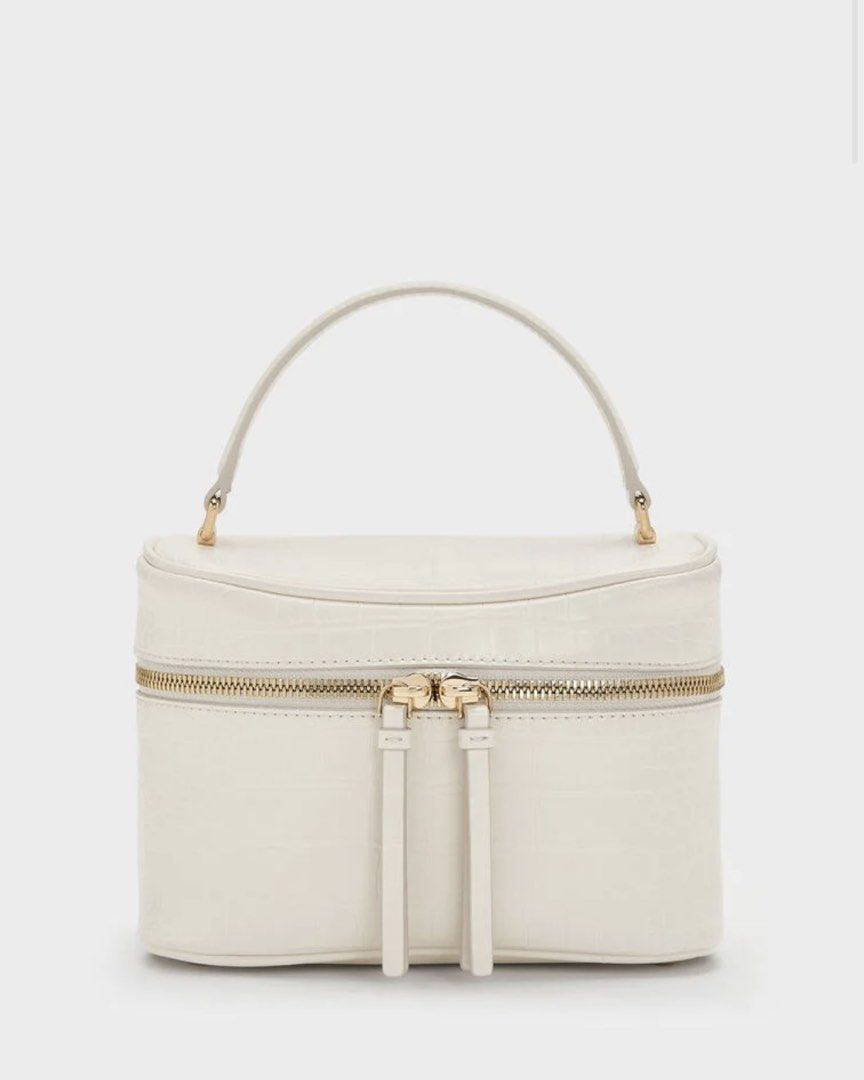 Charles and Keith Pansy Croc Effect Vanity Bag (Category: Shoulder Bags) located in Taguig. Submitted by poshcity (Listing ID 1468158855, Image 2). Description: ✨PLEASE MAKE READING A HABIT✨ INCLUSIONS: ✨: With Tag ✨: What you see is what you get ✨: Manage your expectations. Items are all MPO/Mall Pull Out — ✔️: Sure buyers only should fill up the form, No form No item. ✔️: Payment first policy. No COD & COP. .