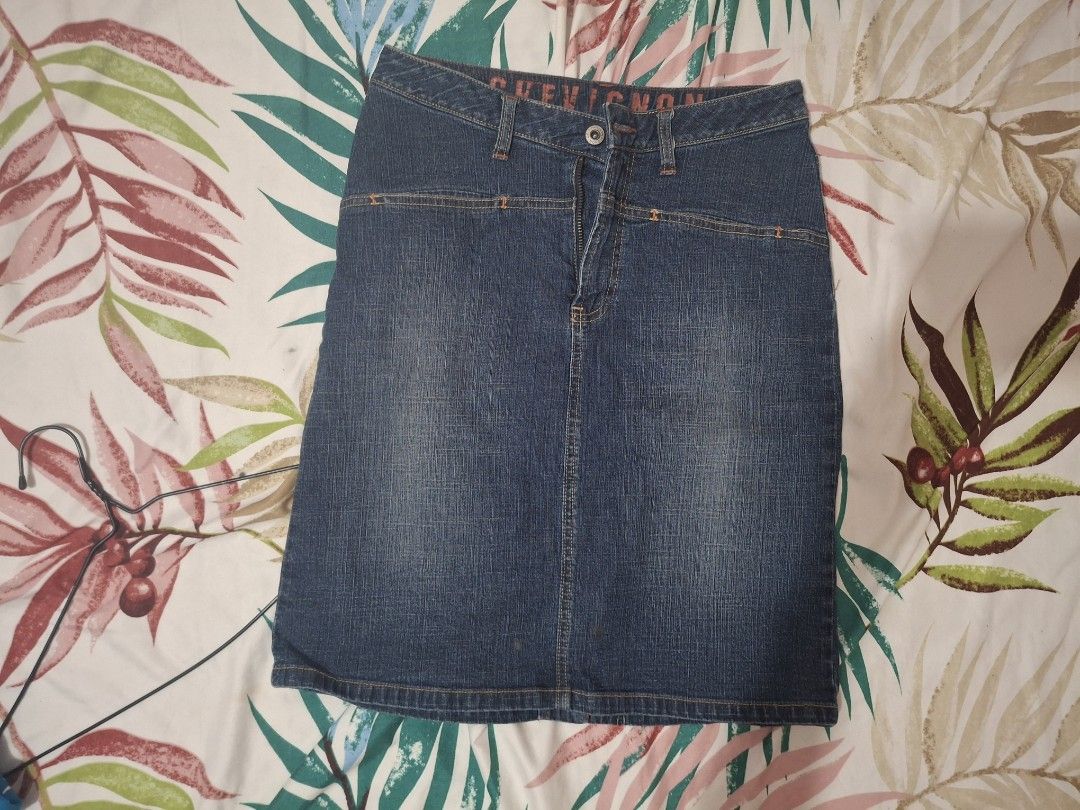 Chevignon Blue Denim A-Line Skirt (Category: Skirts) located in Manila. Submitted by oddcat_ccd2d5 (Listing ID 1468109553, Image 1). Description: Classic blue denim skirt from Chevignon. Size: M-L. Waistline 29-30.