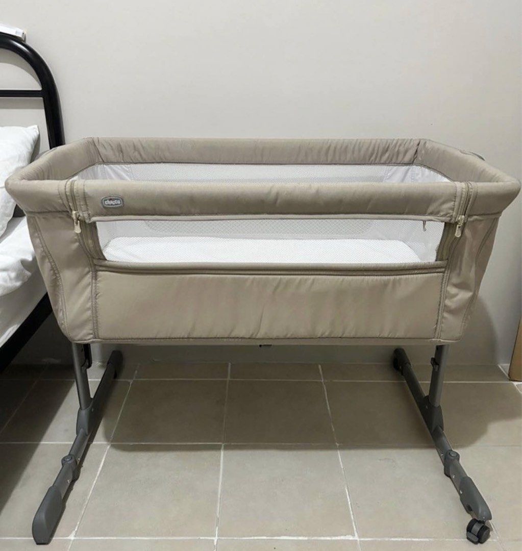 Chicco Next2Me Essential Crib (Category: Cots & Cribs) located in San Juan City. Submitted by rlcaps (Listing ID 1468156488, Image 1). Description: - Model: Chicco Next2Me Essential Crib - Color: Neutral Beige (matches any nursery) - Safe co-sleeping design that attaches securely right next to your bed - 6 adjustable height levels to fit various bed types - Breathable mesh sides for maximum airflow and easy baby monitoring - Foldable feet and smo