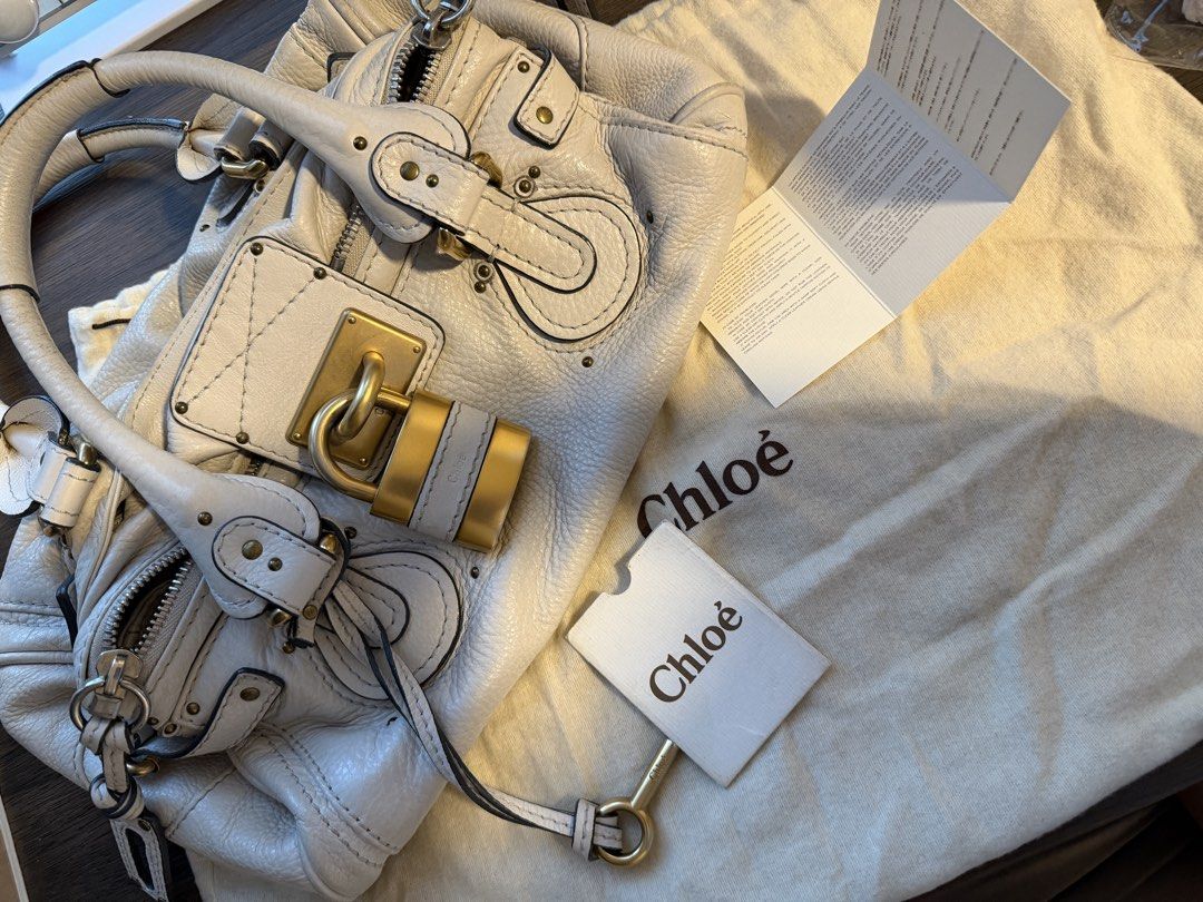chloe paddington white medium gold hardware (Category: Luxury Bags & Wallets) located in Pasig City. Submitted by shanni33 (Listing ID 1468153219, Image 1). Description: guaranteed authentic - dustbag - paper - complete lock and key.