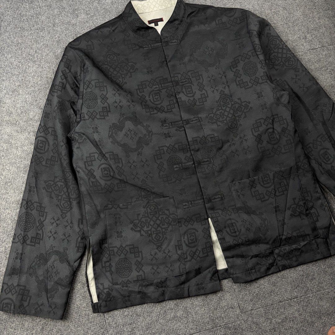 CLOT x TOLQ Silk Chinese Collar Printed Jacket (Category: Coats, Jackets and Outerwear) located in Manila. Submitted by yourtherapist_ (Listing ID 1468249056, Image 2). Description: CLOT x TOLQ Silk Chinese Collar Printed Jacket Size: L Condition: Excellent Material: 100% Polyester Made in: Japan Measurements Width: 24 Length: 29 Shoulder: 19 Sleeve: 25 .