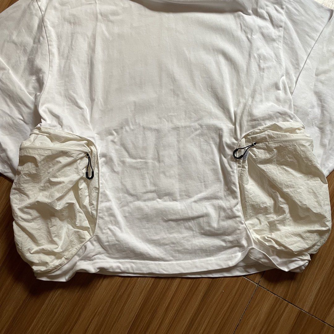 CMF Outdoor Garment Phantom Tee LS (Category: Coats, Jackets and Outerwear) located in General Mariano Alvarez. Submitted by 4117_thriftnthrive (Listing ID 1468233999, Image 3). Description: In excellent condition No flaws Size: S on tag fits L to XL Measurements Width: 24” Length: 29”.