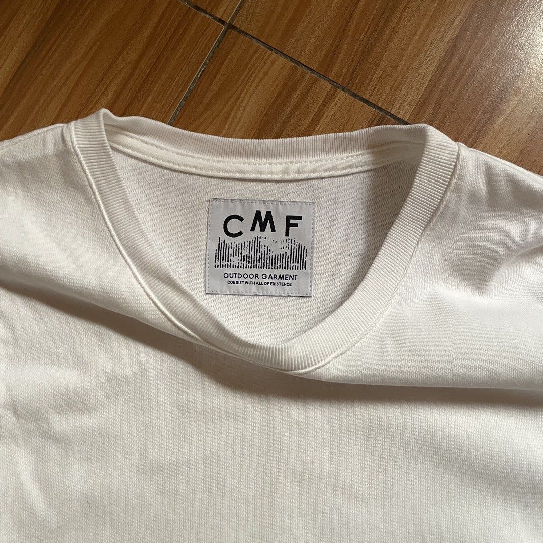 CMF Outdoor Garment Phantom Tee LS (Category: Coats, Jackets and Outerwear) located in General Mariano Alvarez. Submitted by 4117_thriftnthrive (Listing ID 1468233999, Image 2). Description: In excellent condition No flaws Size: S on tag fits L to XL Measurements Width: 24” Length: 29”.