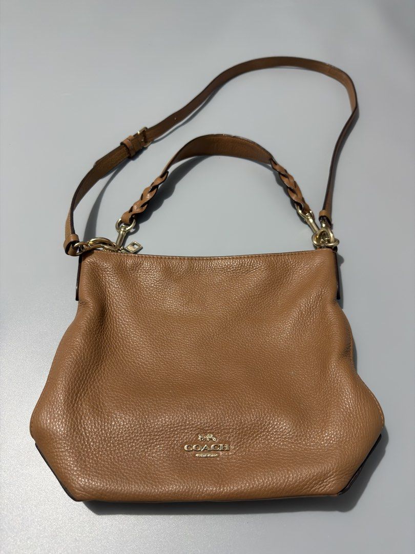 Coach Abby Duffle Bag (Category: Shoulder Bags) located in Calumpit. Submitted by Essentiality (Listing ID 1468092426, Image 1). Description: ₱3,000 Issue: Small ink stain on the back of the bag (as shown in the image).
