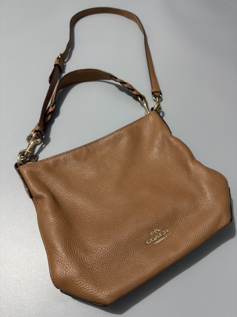 Coach Abby Duffle Bag (Category: Shoulder Bags) located in Calumpit. Submitted by Essentiality (Listing ID 1468092426, Image 2). Description: ₱3,000 Issue: Small ink stain on the back of the bag (as shown in the image).