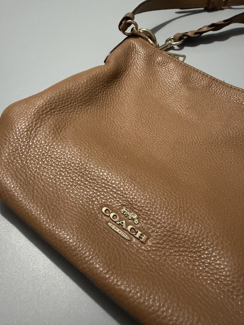Coach Abby Duffle Bag (Category: Shoulder Bags) located in Calumpit. Submitted by Essentiality (Listing ID 1468092426, Image 3). Description: ₱3,000 Issue: Small ink stain on the back of the bag (as shown in the image).