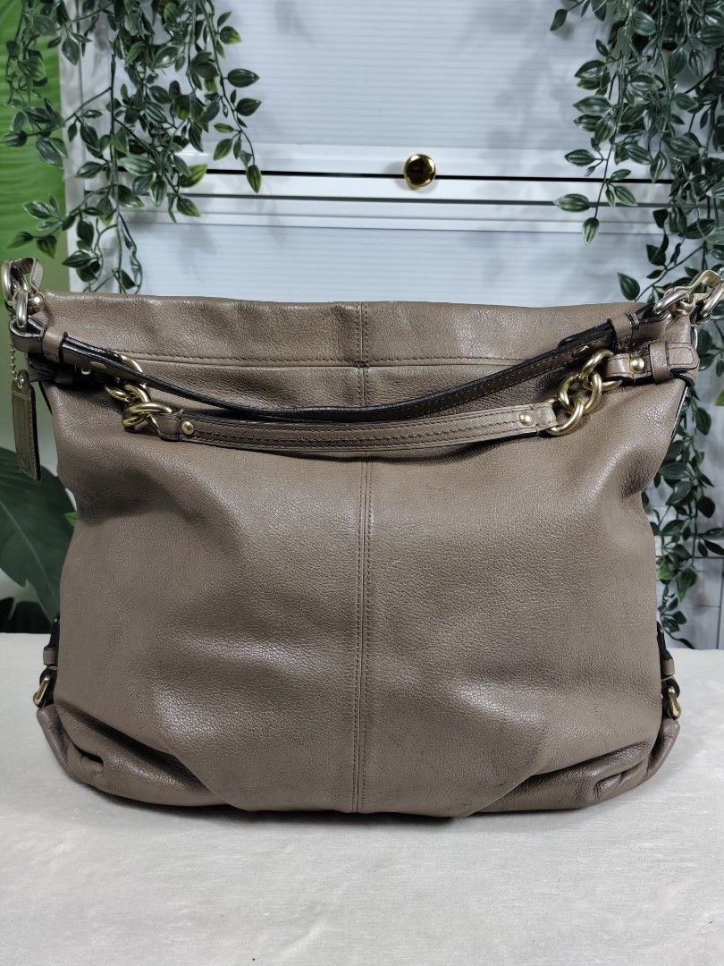 Coach Brooke Hobo (Authentic/OG) (Category: Luxury Bags & Wallets) located in General Trias. Submitted by _roseandcarry (Listing ID 1468091157, Image 1). Description: Coach Brooke Hobo - Brown Taupe 🏷️ Style Code: 14141 (2009) 🔎 Authenticity: Authentic/OG 🇯🇵 sourced 🔍 Issues: Hardware tarnishing, pen mark on ziper line, bottom spot stain, minor black/white markings on the body (barely noticeable), pen marks on inner linings, generally clean.