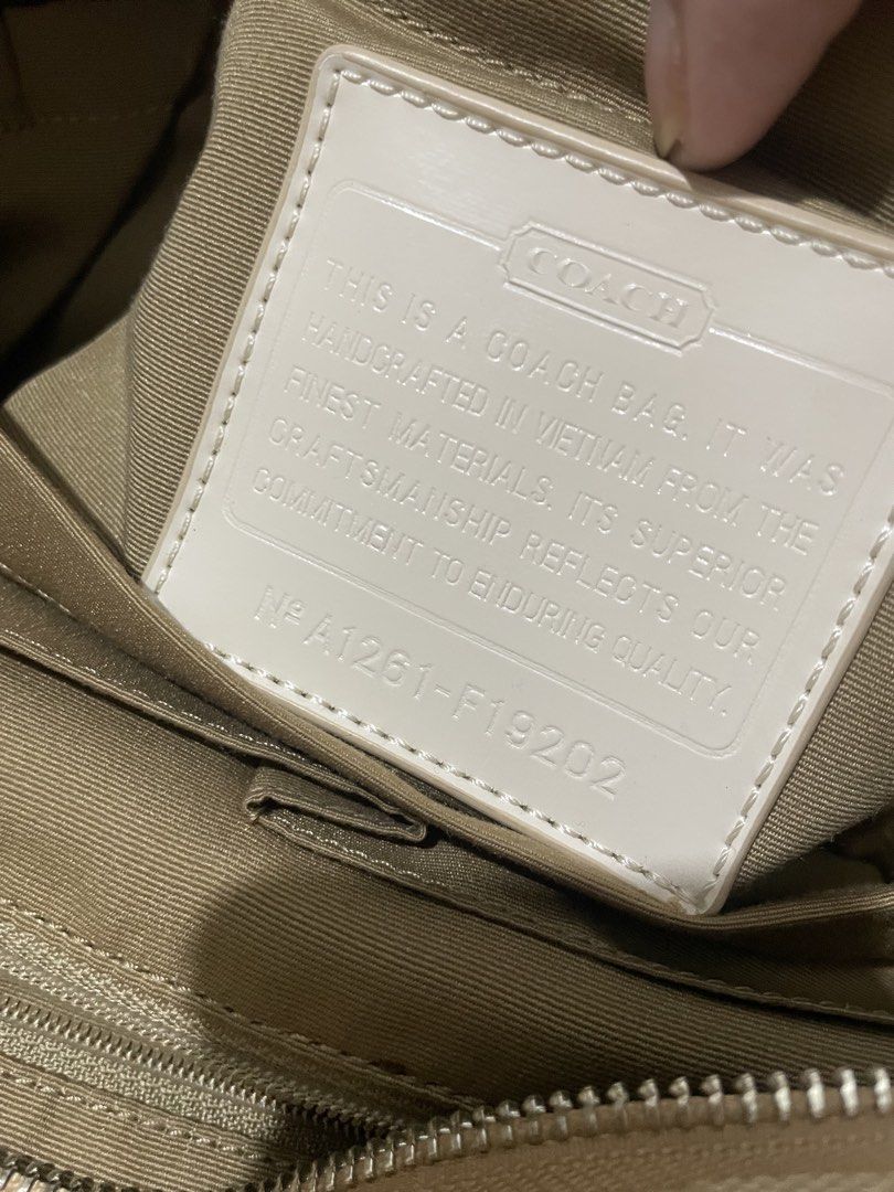 Coach diaper mommy bag (Category: Luxury Bags & Wallets) located in Malabon City. Submitted by bagsnilucas (Listing ID 1468081263, Image 3). Description: Selling our Coach Diaper/Mommy bag in beige canvass steal for 2,800 Multiple interior pocket Comes with changing pad Signs of use on the handle No extra long strap Washable dirt due to usage Authentic .