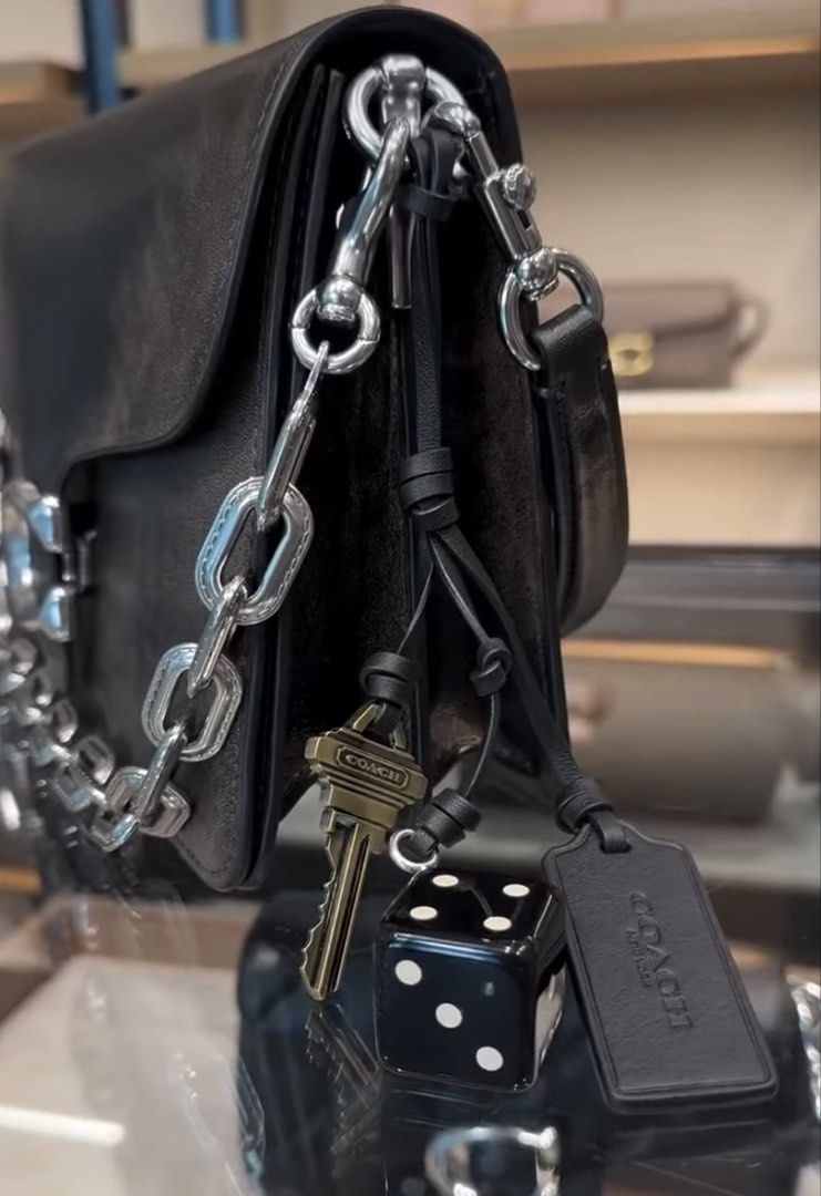 Coach Tabby Chain Loved Leather SHW (Category: Luxury Bags & Wallets) located in Pasig City. Submitted by the90sph (Listing ID 1468110341, Image 3). Description: - Brand: Coach (bought straight from the official store Japan) - Material: Distressed brown leather - Hardware: Chunky silver chain with iconic C logo clasp - Strap: Black leather shoulder strap and long strap - Inclusions: original paper bag - Condition: Guaranteed authentic and brand n