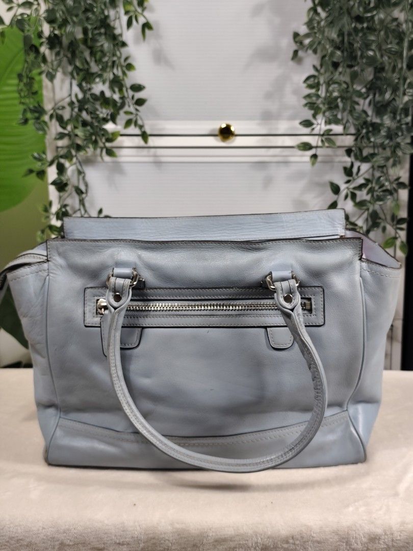 Coach Legacy Candace Carryall (Authentic/OG) (Category: Luxury Bags & Wallets) located in General Trias. Submitted by _roseandcarry (Listing ID 1468075761, Image 2). Description: Coach Legacy Candace Carryall - Light Blue / Baby Blue / Powder Blue 🏷️ Style Code: 24201 (2013) 🔎 Authenticity: Authentic/OG 🇯🇵 sourced 👉🏻 Issues: Color fading, corner scuffing, cracking on rubber linings, normal handling leather darkening/patina, few dirt smudges