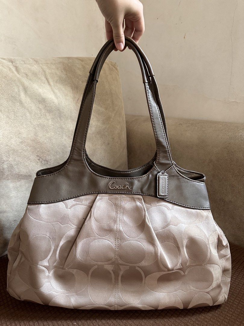 Coach Lexi Hobo Bag (Category: Luxury Bags & Wallets) located in Manila. Submitted by happyocean22 (Listing ID 1468198102, Image 1). Description: - High-quality materials for long-lasting durability - Sleek design suitable for daily needs - Compact and easy to handle or store.