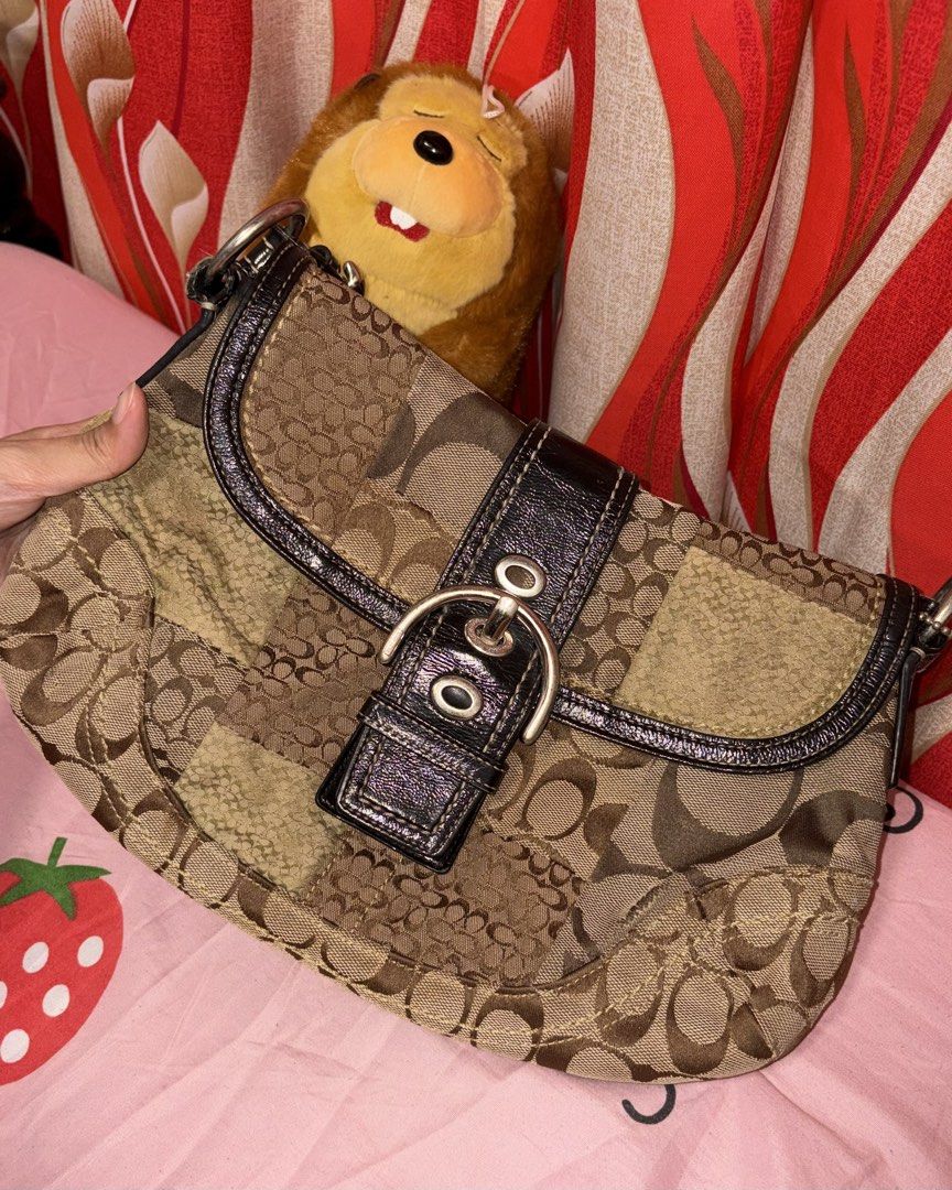 Coach Patchwork Soho Brown (Category: Luxury Bags & Wallets) located in Valenzuela. Submitted by diaryniandrea (Listing ID 1468211009, Image 3). Description: Authentic Coach Signature Patchwork Soho Condition: AB - with rubs, stains, and cracks on leather handle Check photos for the rubs, stains, and cracks on leather All items are preloved, please manage your expectations accordingly. Location: Valenzuela.