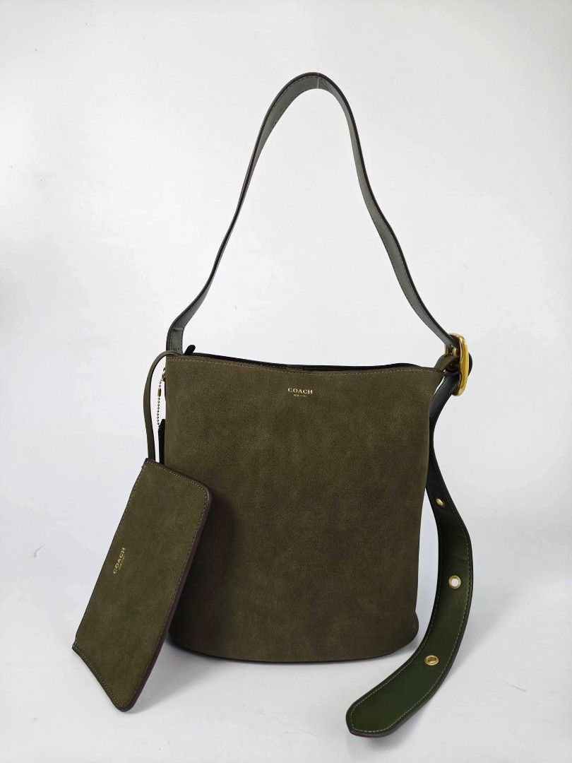 COACH suede bleecker bucket bag olive green (Category: Luxury Bags & Wallets) located in Quezon City. Submitted by brittneytan (Listing ID 1468120196, Image 2). Description: .