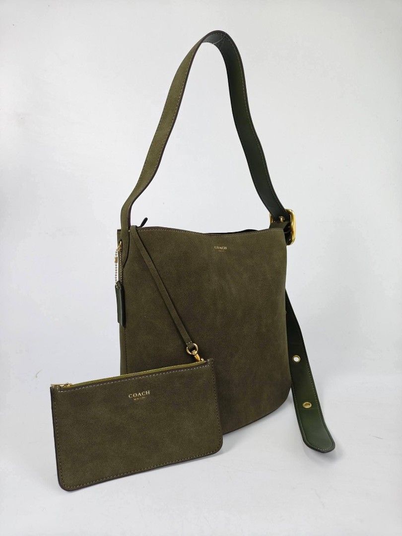 COACH suede bleecker bucket bag olive green (Category: Luxury Bags & Wallets) located in Quezon City. Submitted by brittneytan (Listing ID 1468120196, Image 3). Description: .