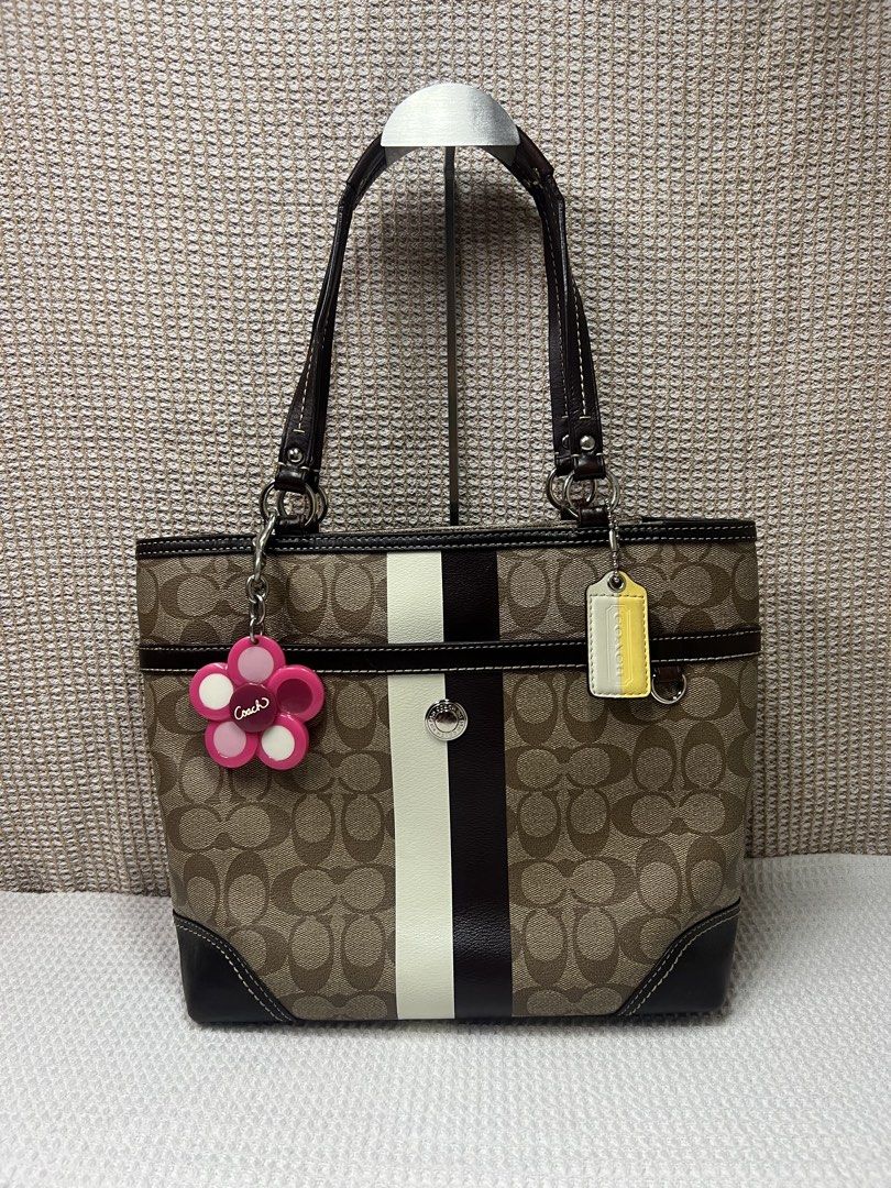 Coach Tote (Category: Shoulder Bags) located in Makati City. Submitted by heyitscesss (Listing ID 1468084236, Image 1). Description: flower charm - add 1,399 💗.