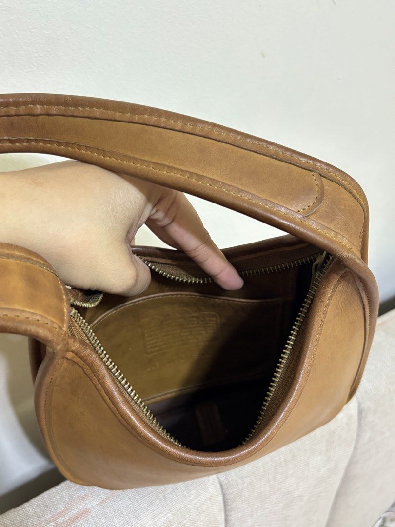 Coach Vintage Ergo (Category: Shoulder Bags) located in Cabanatuan. Submitted by cristalyngonzales (Listing ID 1468112186, Image 2). Description: Co ach Vintage Ergo Mini Zip #9020 in Toffee 🍪 7,300 Php In good cond, signs of usages in the leather pls see posted dets. Collectors item 💯.